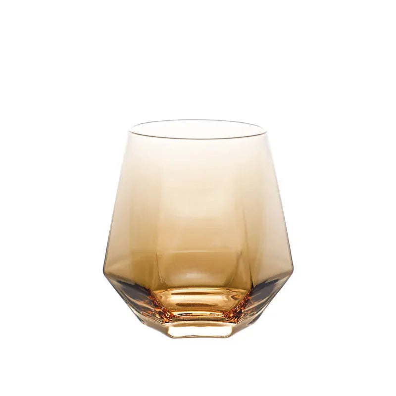 Amber tinted hexagonal glass on a white background. The glass has a gradient from light to dark amber.