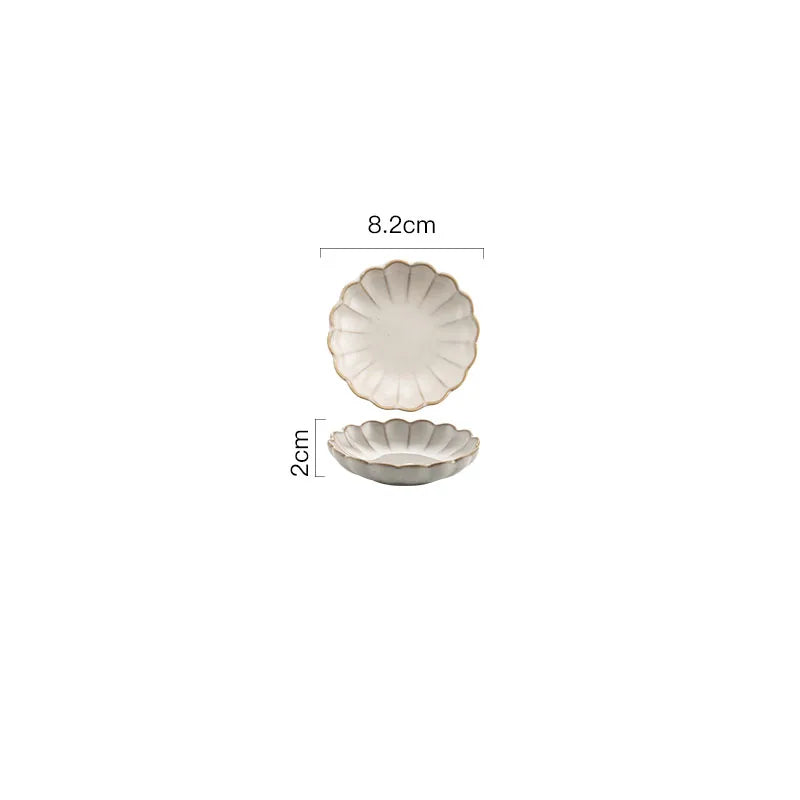 A small, round ceramic dish with a scalloped rim and ribbed texture, measuring 8.2cm in diameter and 2cm in height.