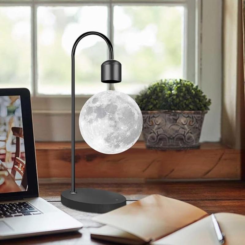 Innovative levitating moon lamp with wireless charging, offering a mesmerizing display and practical functionality.