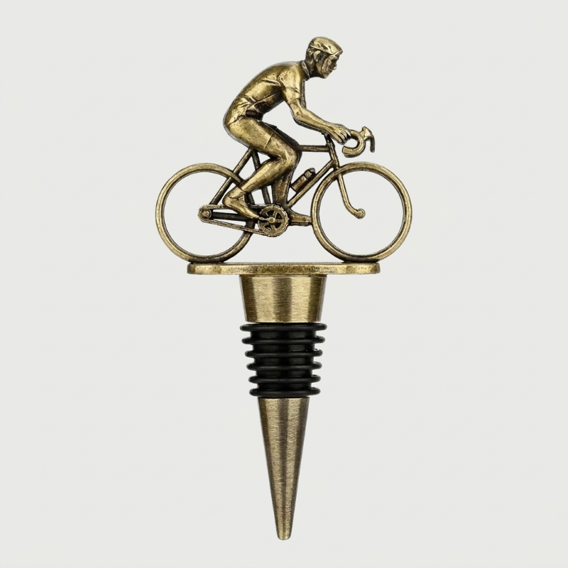 Bronze bottle stopper with cyclist design on a white background