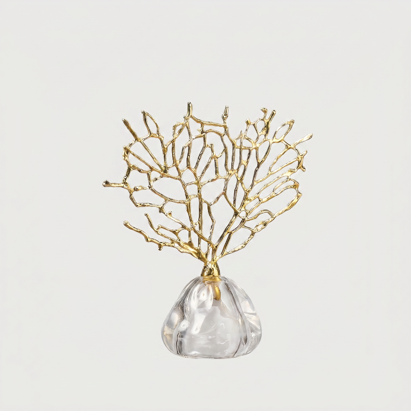 Gold coral sculpture on white background