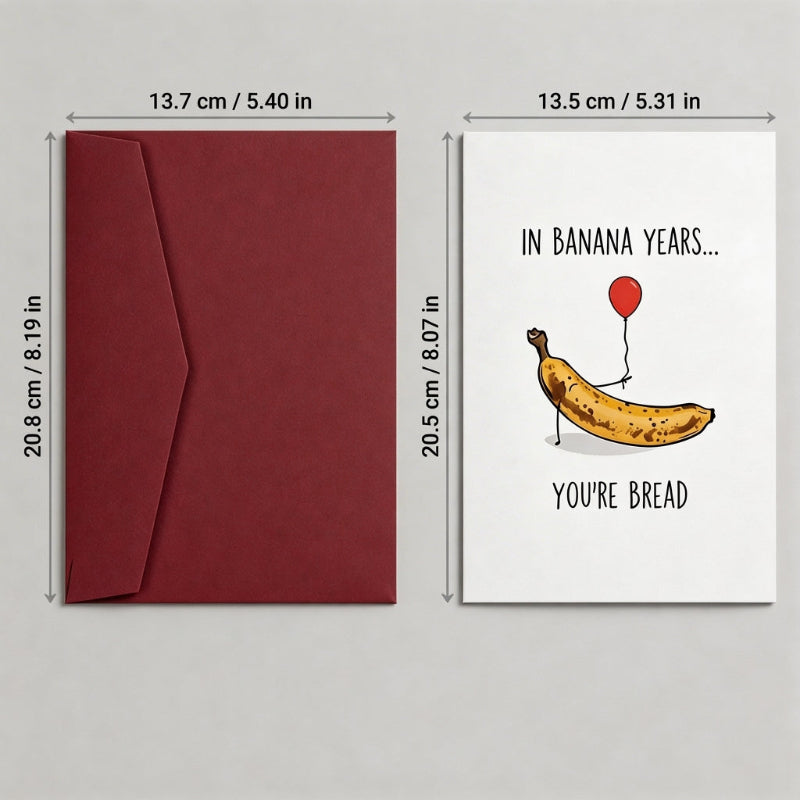 Red envelope and greeting card with banana illustration and text on a gray background