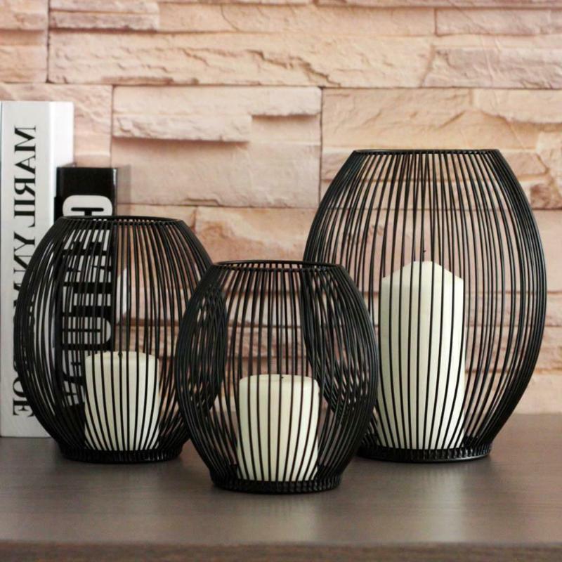 Stylish iron candle holder with a sturdy base, perfect for holding your favorite candles while complementing modern decor.