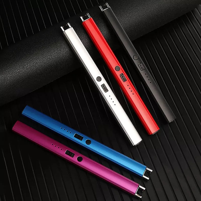Five slim, cylindrical electric arc lighters in different colors (white, red, black, blue, and purple) arranged diagonally on a textured black surface. The lighters have small buttons and indicator lights.