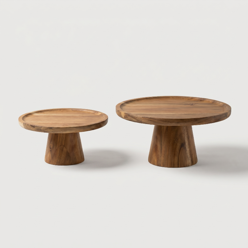 Solid wood pedestal cake stands on white background