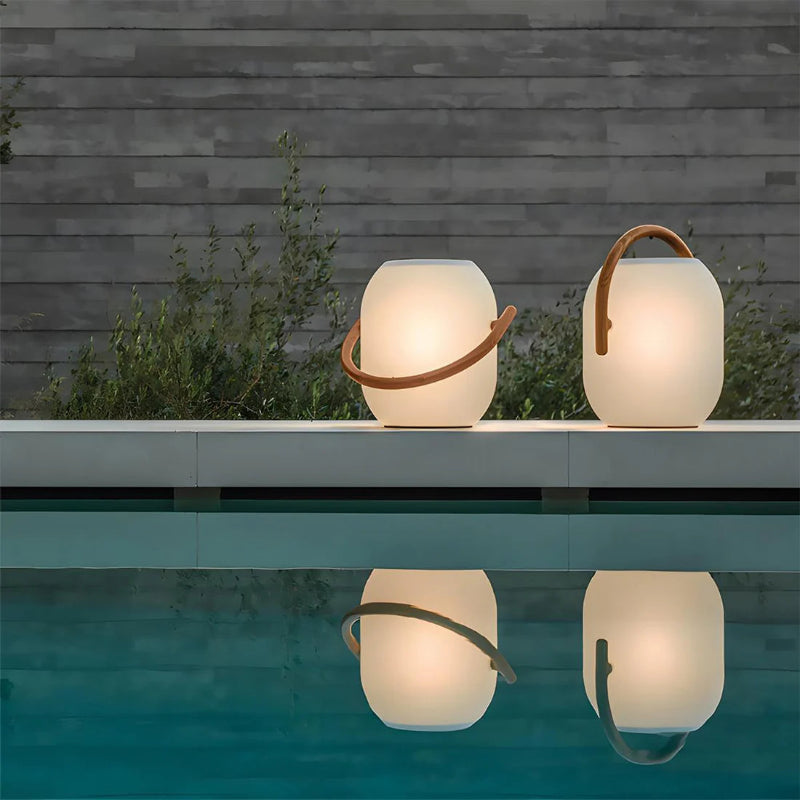 Black solar-powered landscape light with ambient 360° glow