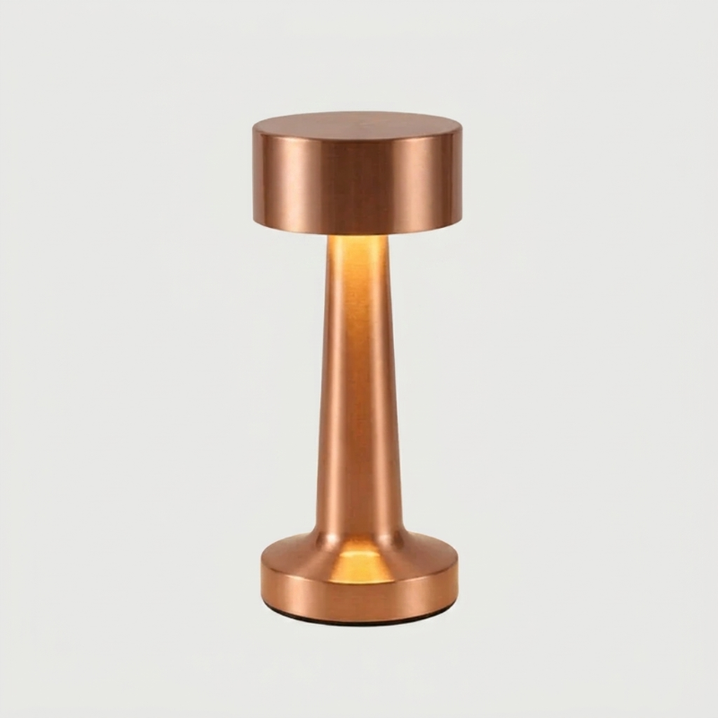 Zain cordless rechargeable table lamp in rose gold on white background
