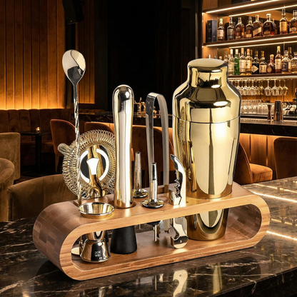Gold cocktail bar tool set featuring essential tools for home bartending.