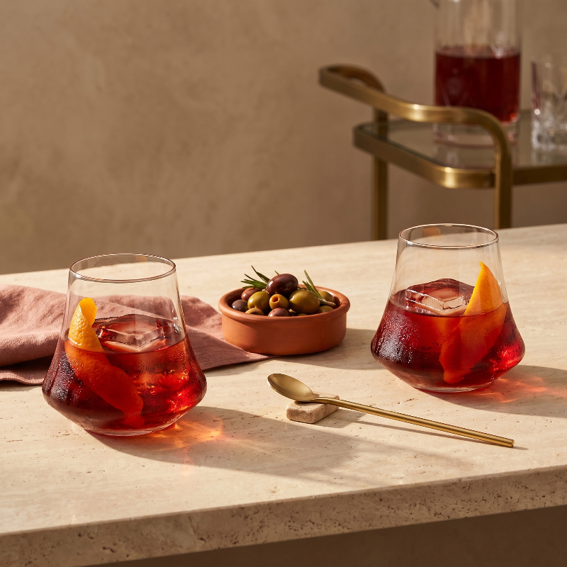 10-oz. double old-fashioned whiskey glasses with cocktails on table