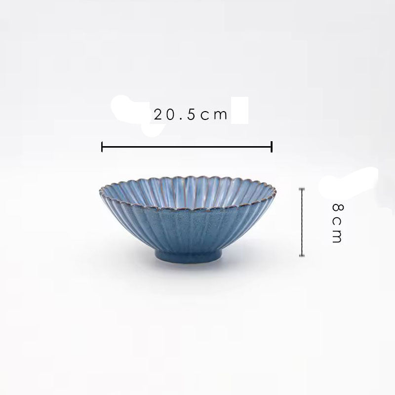A blue ceramic serving bowl with its dimensions labeled as 20.5 cm wide and 8 cm high.