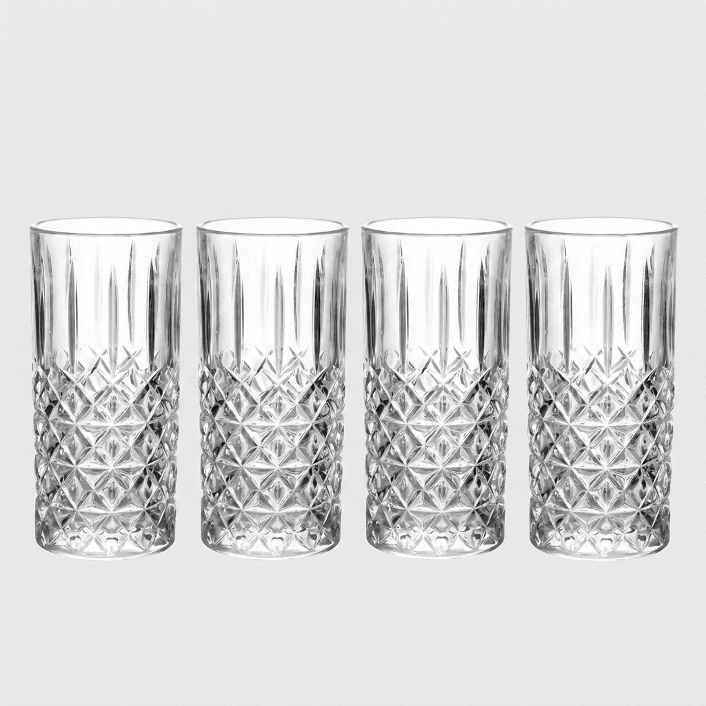 Set of four 11oz faceted highball glasses on a plain white background