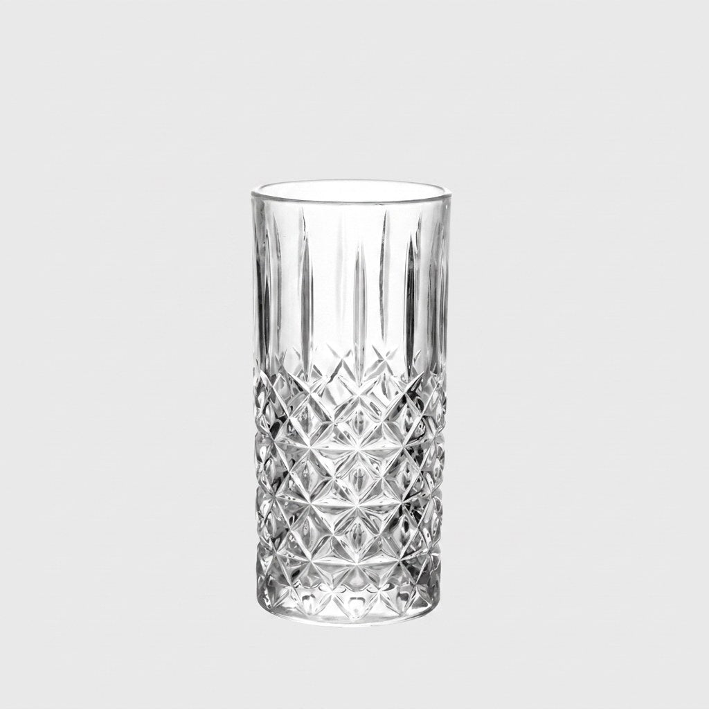 11oz faceted highball glass, single glass, on a plain white background