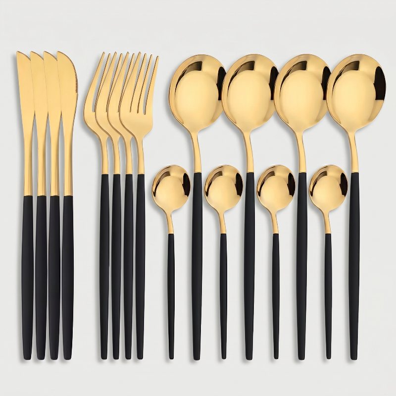 Black and gold stainless steel 16-piece cutlery set with white background.