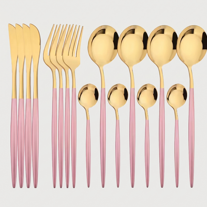 Gold and pink stainless steel 16-piece cutlery set with white background.