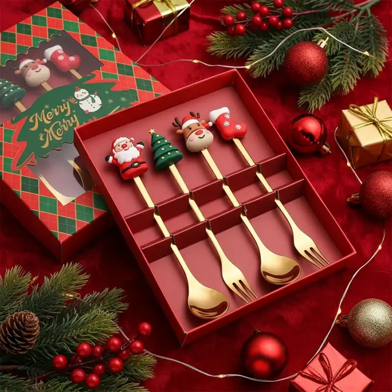A festive set of Christmas-themed spoons and forks in a gift box.