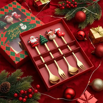 A festive set of Christmas-themed spoons and forks in a gift box.