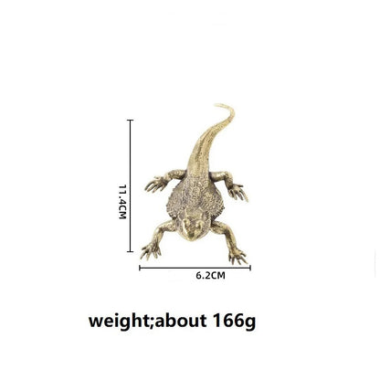 Bronze lizard figurine with dimensions 11.4cm x 6.2cm and a weight of 166g.