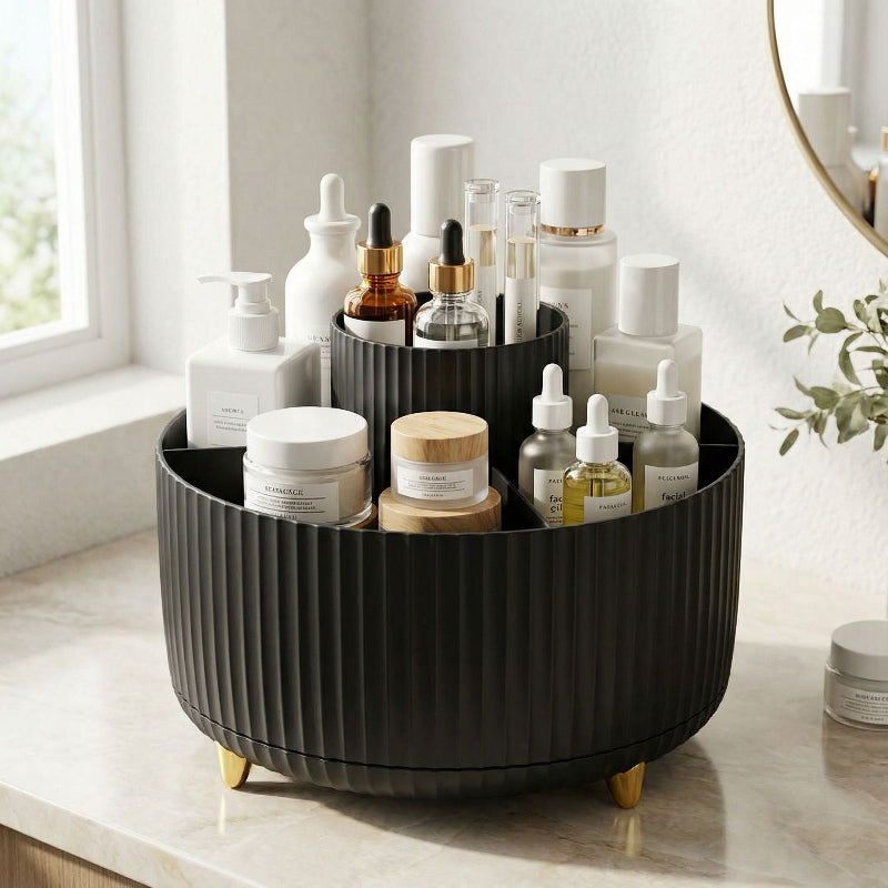 Black round rotating makeup organizer for everyday makeup storage.