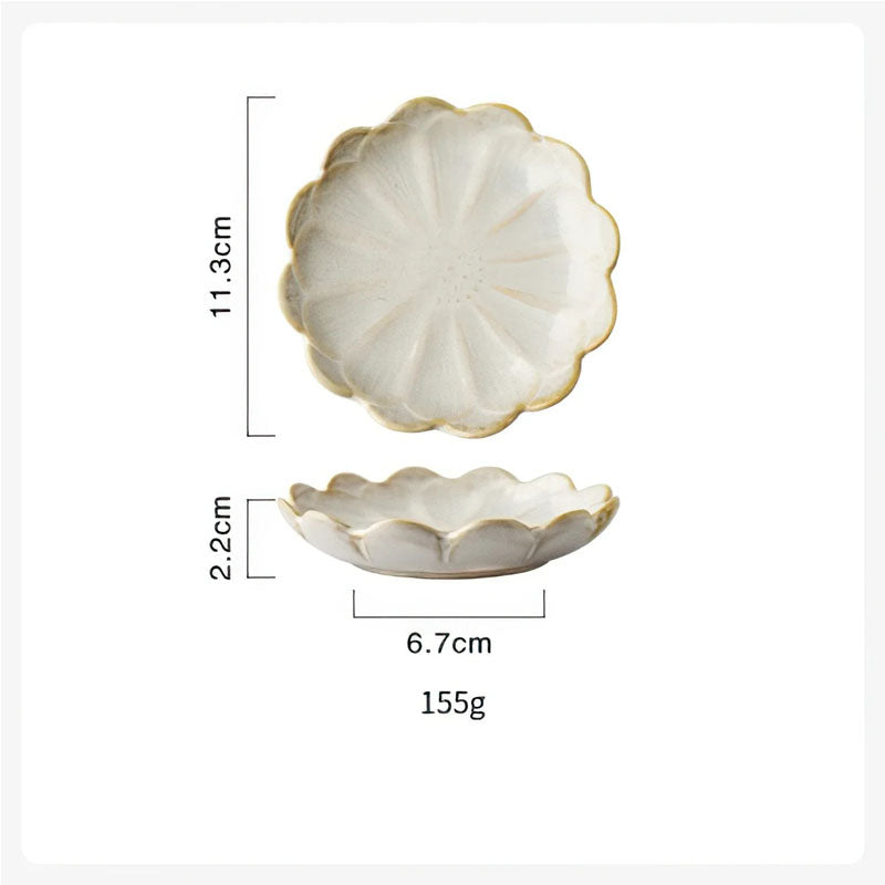 Dimensions diagram for a white, flower-shaped condiment dish showing a length of 11.3cm, height of 2.2cm, bottom width of 6.7cm, and weight of 155g.