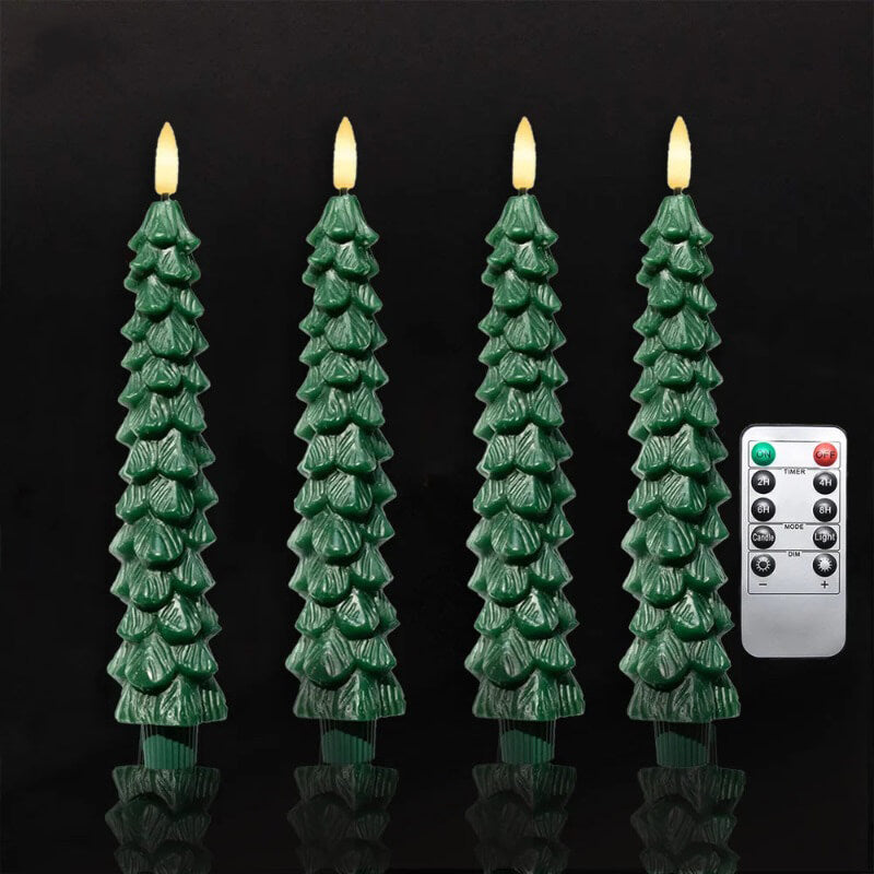 Four green LED candles shaped like Christmas trees with a remote control, set against a dark background.