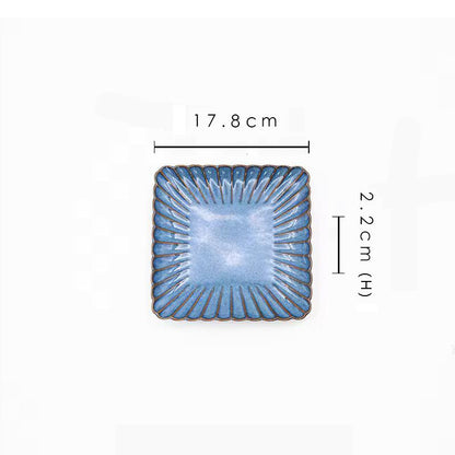 A blue square ceramic plate with its dimensions labeled as 17.8 cm wide and 2.2 cm high.