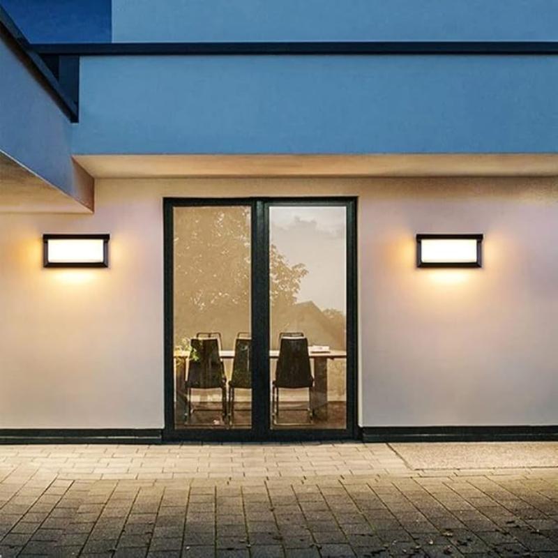 The Arya 1 Motion Sensor Light in an outdoor setting. Perfect for balconies or patios, this weather-resistant light enhances security with its automatic on/off function.