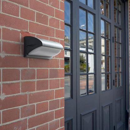 Showcasing the Arya Motion Sensor Light in its unlit state, this sleek design blends seamlessly into outdoor spaces. With its radar sensor technology, it remains off until motion is detected, providing energy-efficient illumination when needed.