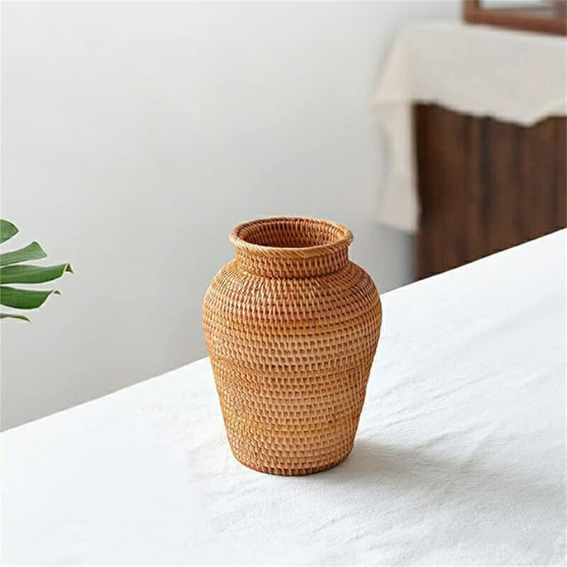 Boho-inspired rattan vase, ideal for creating a cozy, nature-filled ambiance.