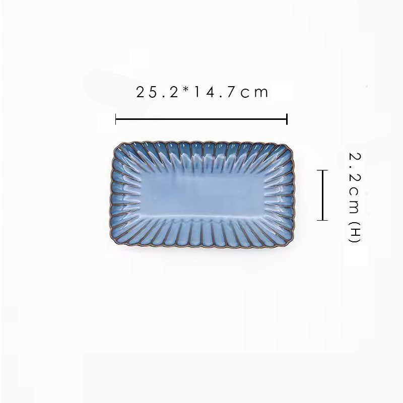 A blue rectangular ceramic plate with its dimensions labeled as 25.2 x 14.7 cm and 2.2 cm high.