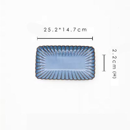 A blue rectangular ceramic plate with its dimensions labeled as 25.2 x 14.7 cm and 2.2 cm high.