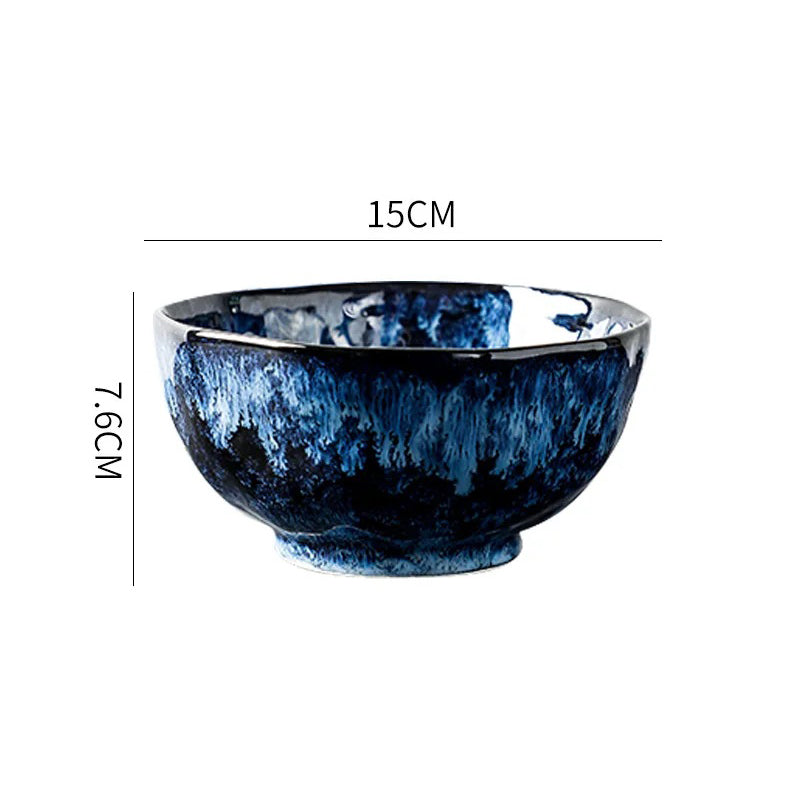 A round ceramic bowl with a dark blue and white textured pattern, showing its dimensions: 15cm in diameter and 7.6cm in height.