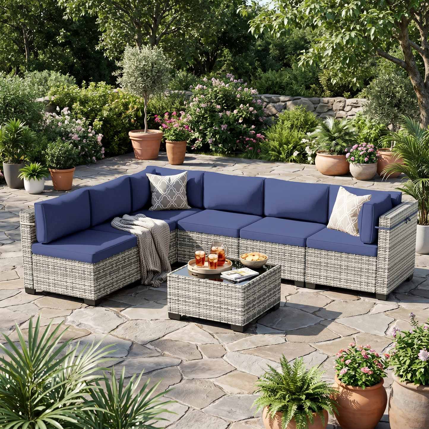 Navy blue cushion 7-piece wicker outdoor sectional with coffee table on a garden patio