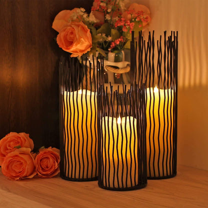 Elegant iron candle stands, designed to add a touch of sophistication and warmth to any space.