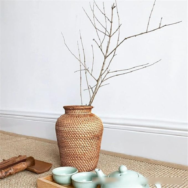 Stylish rattan woven vase perfect for floral arrangements and home styling.