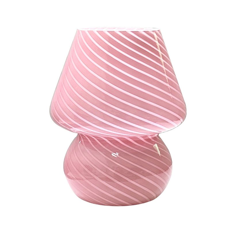 A pink striped glass mushroom lamp, featuring a modern, curved design with elegant diagonal stripes. The lamp emits a soft, warm glow, making it a perfect aesthetic piece for cozy home decor.