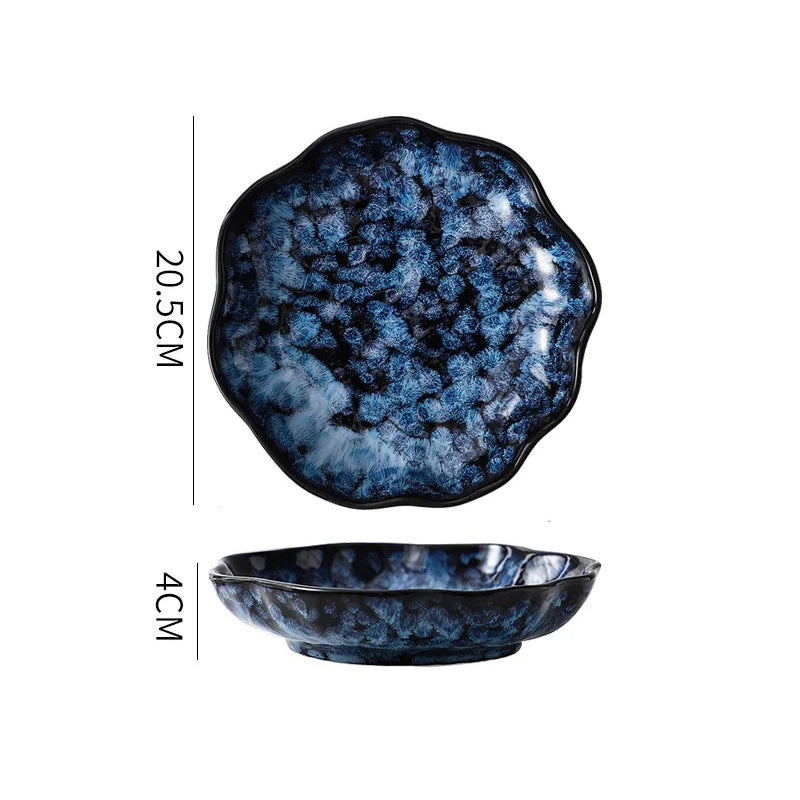 A deep, dark blue and white textured ceramic plate, showing its dimensions: 20.5cm in diameter and 4cm in height.