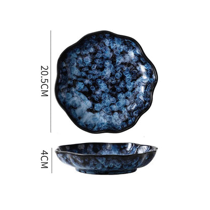 A deep, dark blue and white textured ceramic plate, showing its dimensions: 20.5cm in diameter and 4cm in height.