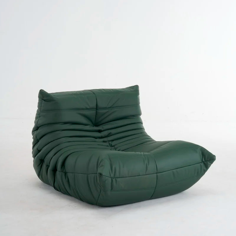 Green leather modern lounge chair.