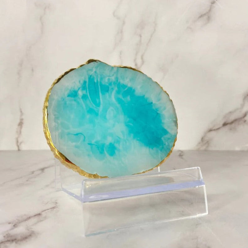 Blue agate coaster with unique marbled designs, perfect for home decor or protecting surfaces