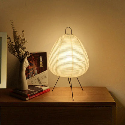 Akari lamp with its dimmable feature, adjusting the brightness to create the perfect mood lighting for any occasion.