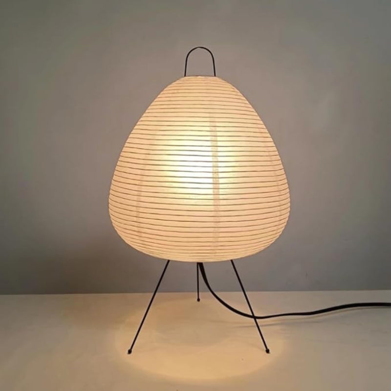 Elegant Akari lamp with a minimalist design, casting a soft, warm glow.