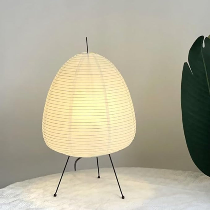 Sculptural Akari lamp providing ambient light with a unique modern twist.