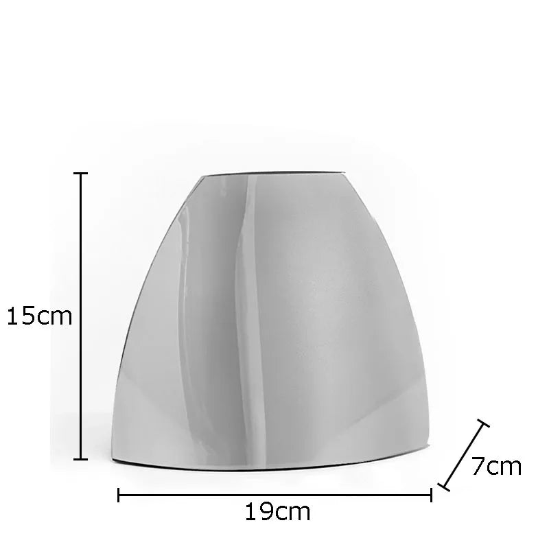 Small Arc Vase with a height of 15 centimeters and width of 19 centimeters, highlight its compact size and sleek design.