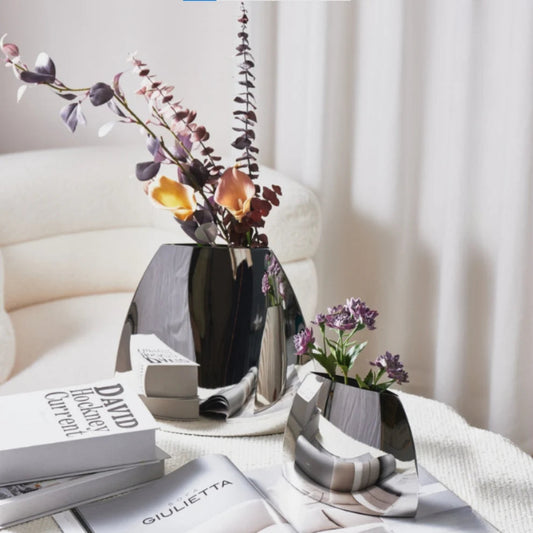 Elegant Arc Vase with a curved design, perfect for showcasing fresh flowers or as a statement piece.