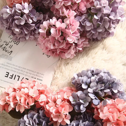 Realistic artificial hydrangeas with rich, textured petals and natural-looking stems.