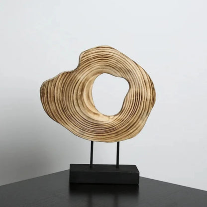 Natural wooden sculpture with a rustic, organic appeal, perfect for home decor.