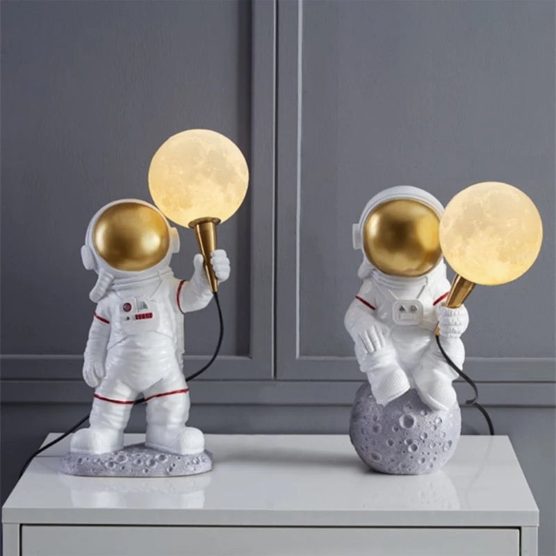 Bring the cosmos into your home with the captivating Astronaut Lamp. Featuring a beautifully detailed astronaut figure holding a glowing LED light, this unique lamp adds a touch of space adventure to any room. Perfect for bedrooms, offices, or play areas, it's both functional and out-of-this-world decor.