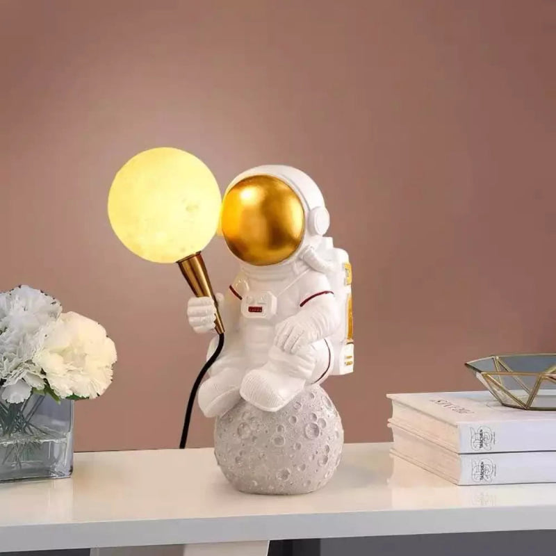 Astronaut lamp casting a soft glow, ideal for creating a playful and imaginative atmosphere.