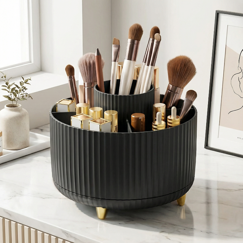 Minimal black rotating makeup organizer for organized makeup storage.