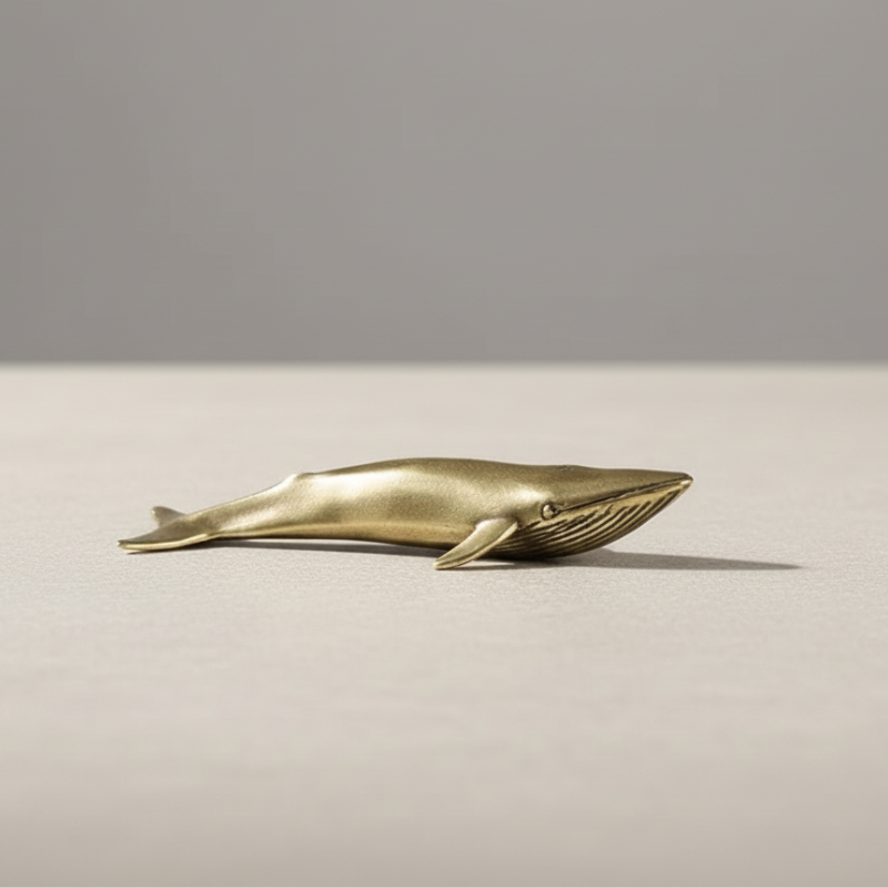 Brass Blue Whale sculpture on white background – handcrafted coastal decor by Kiyo Home